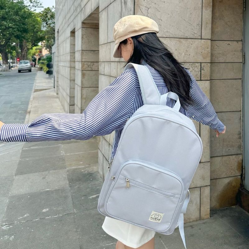 High-capacity grey travel rucksack crafted from sustainable heavy-duty textiles